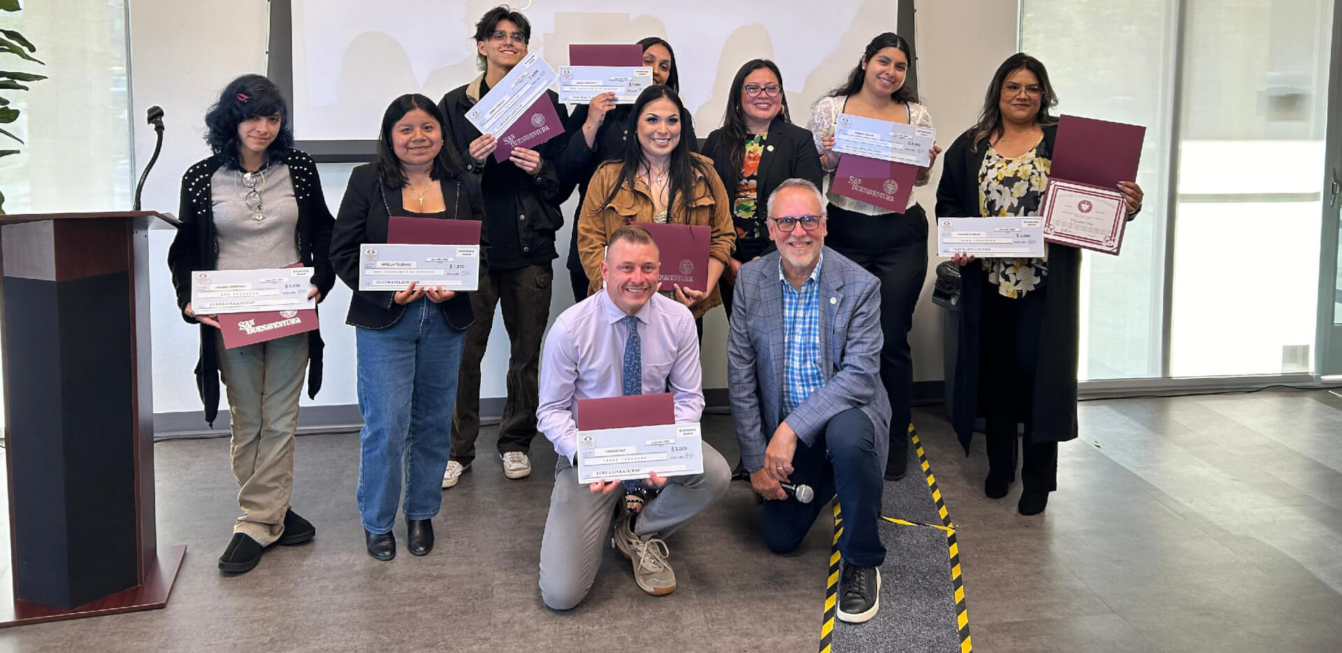 group photo of smiling scholarship winners
