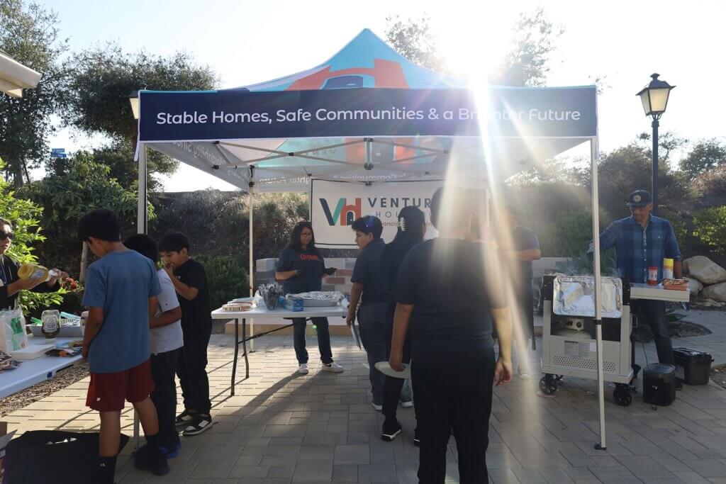 people attending a Ventura Housing BBQ