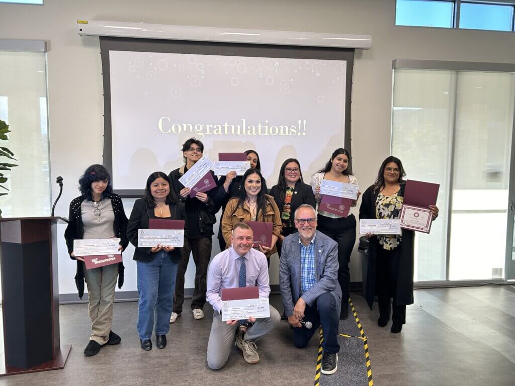 group of students receiving scholarships